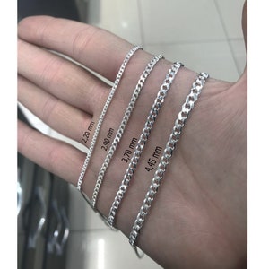 May include: Four silver chains of different widths, 2.20 mm, 2.90 mm, 3.70 mm, and 4.45 mm.