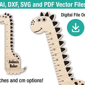 May include: A wooden dinosaur-shaped growth chart with black markings and a smiling face. The chart measures in inches and centimeters. The text "Aiden's Ruler" is engraved on the chart. The chart is a digital download and comes in AI, DXF, SVG, and PDF vector files.