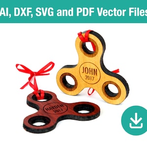 May include: Two wooden fidget spinner ornaments with red ribbon. The top ornament is light brown with the name "JOHN" and the year "2017" engraved on it. The bottom ornament is dark brown with the name "HAYDEN" and the year "2017" engraved on it.