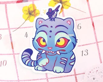 May include: A sticker of a cartoon cat with blue fur and yellow eyes. The cat has a striped tail and a small bird wearing a hat on its head. The sticker is on a calendar page with the text "HAIYUN.MOE".