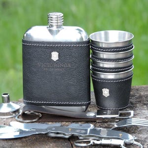 Victorinox Swiss Army camping kit - flask, funnel, 6 shot glasses, multi-tool, keychain - stainless steel leather set with silver logo.
