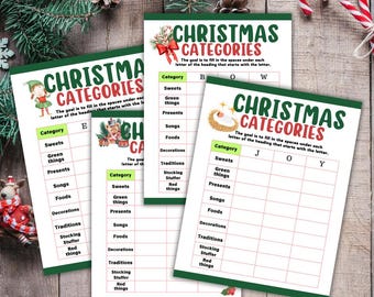 May include: Three printable Christmas category game cards with green and red borders. Each card has a grid with the headings "Sweets", "Green things", "Presents", "Songs", "Foods", "Decorations", "Traditions", "Stocking Stuffer", and "Red things". The goal of the game is to fill in the spaces under each letter of the heading that starts with the letter. The letters for each card are "E", "B O W", and "J O Y".