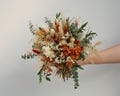 Rust and Sage Green Bridal Bouquet Terracotta Bouquet Boho Bridal Bouquet Burnt Orange Wedding Bouquet dried rose bouquet Eucalyptus bouquet product logo