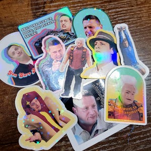 May include: A collection of holographic stickers featuring various images of a man in different poses and outfits. Some stickers include text such as "You Sure?" and "Shut the fuck up Doug, you fucking skunk!"