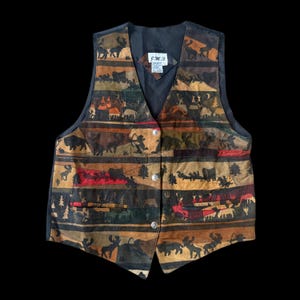 Vintage väst i mocka från 1980-talet i äkta läder med lappmönster, cowboy-, indian-, häst- och bisonmönster från JMT, herrstorlek small