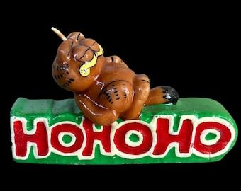Vintage 1981 Garfield “Ho Ho Ho” Christmas Unscented Wax Candle by Enesco United Feature Syndicate 6” (As Is)
