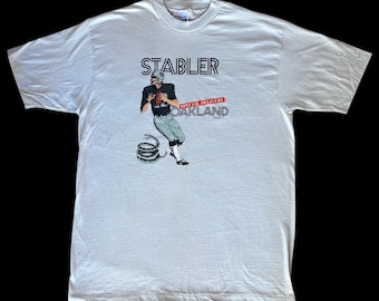 Vintage 1989 Ken Stabler “The Snake” Special Delivery Oakland Raiders NFL Single Stitch White T-Shirt by Super Action (Men’s Size XL)