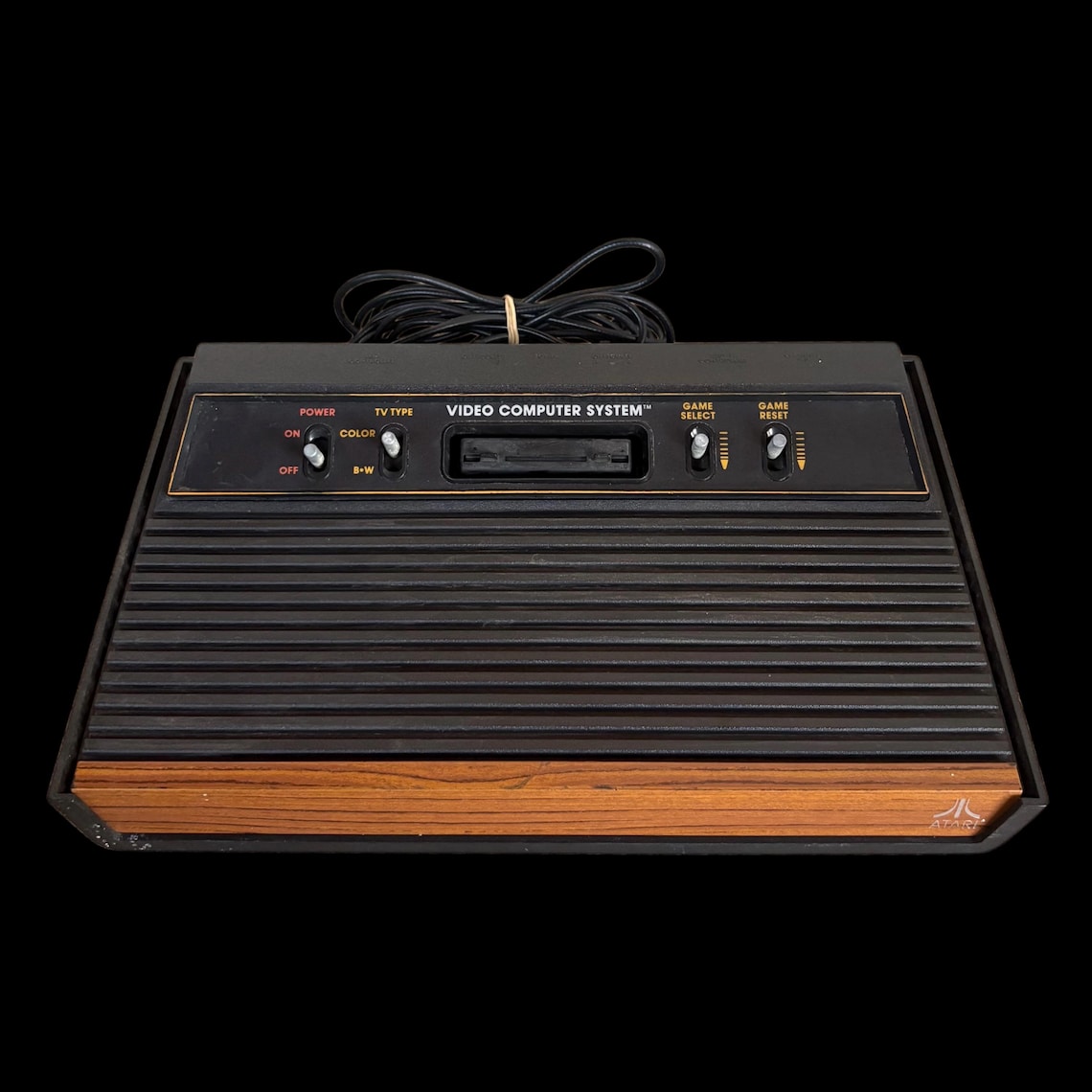 Atari 2600 4-Switch Woodgrain CX2600A Video Game Console Only – TESTED & WORKING – Vintage 1980s Retro Gaming, foto 1 di 5
