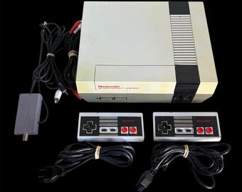 Nintendo Entertainment System NES-001 Video Game Console Bundle w/ 2 Controllers, RF Switch, and AV Cable (Tested & Working) As Is