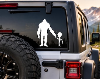 Bigfoot Holding Alien Decal | Funny Sasquatch Vinyl Sticker for Cars, Laptops, Coolers & More