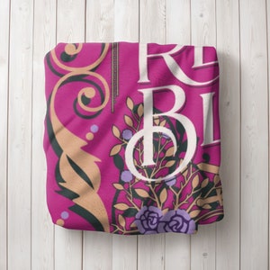 personalized velveteen plush blanket for someone who loves books and reading designed to look like a blue vintage book cover