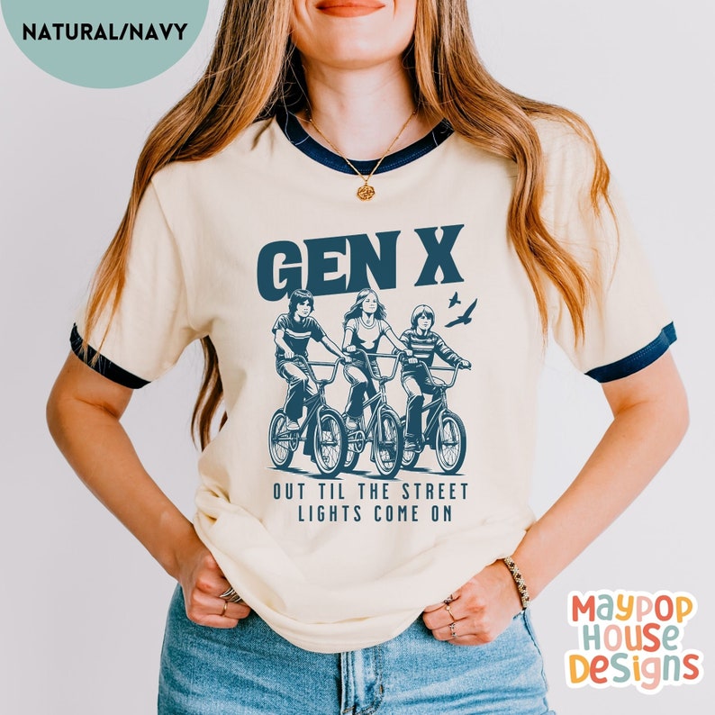 next level ribbed shirt for gen x woman that has three 70s or 80s era kids on bikes and text says gen x out til the street lights come on