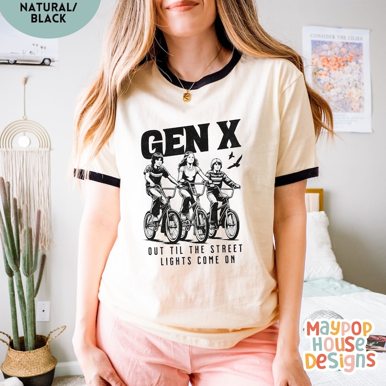 next level ribbed shirt for gen x woman that has three 70s or 80s era kids on bikes and text says gen x out til the street lights come on