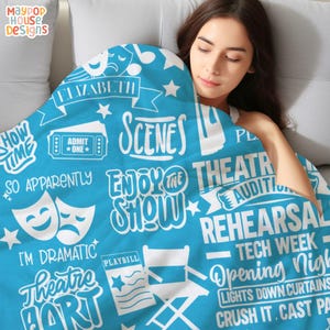 velveteen plush blanket for theater kid drama teacher actor that has a collage of different theater related words clipart and phrases and personalized with name