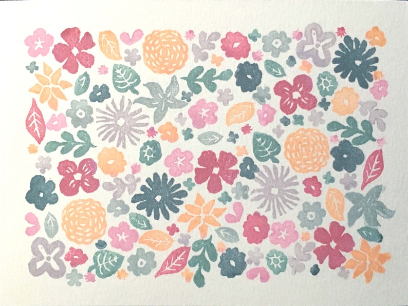 May include: A lovely floral print features a multitude of pastel-colored flowers and leaves.  The design incorporates various flower shapes and sizes in shades of pink, purple, teal, and orange.  Leaves in muted greens complement the blossoms. The overall style is reminiscent of vintage botanical illustrations or block prints. The print is ideal for crafting, home decor, or textile projects. The color palette is soft and harmonious, creating a calming and aesthetically pleasing effect.