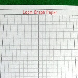 May include: White paper featuring a grid pattern for loom weaving, with the text Loom Graph Paper printed in red at the top. The grid consists of thin gray lines forming small squares, organized into larger sections by thicker black lines.