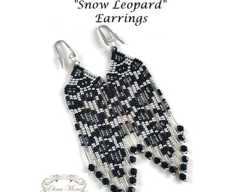 May include: A pair of long, dangling beaded earrings featuring a black and silver snow leopard print pattern. The earrings are constructed with small seed beads and silver-toned metal accents, finished with silver-toned ear wires and black beads.