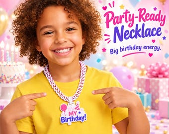 May include: A white chain link necklace featuring a large rectangular pendant with the text 'It's My Birthday!' in blue and pink, decorated with a pink balloon and a party hat graphic. The necklace is worn against a yellow t-shirt background.