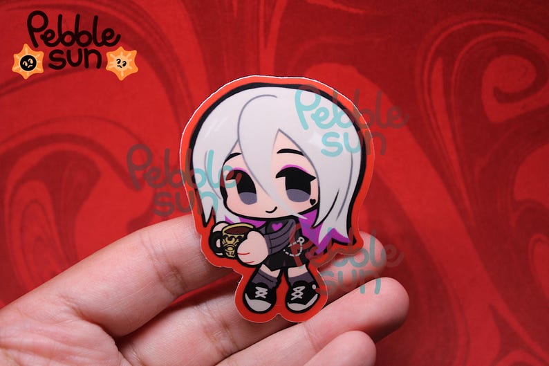 May include: A sticker featuring a cartoon character with white hair and purple highlights, holding a coffee mug. The character is wearing a black outfit with a heart detail. The sticker has a red border and the text "Pebble Sun".