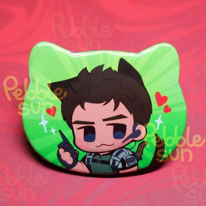 May include: A green cat-shaped button featuring a cartoon character with brown hair and cat ears. The character is holding a device and has a headset. Red hearts and sparkles decorate the background.