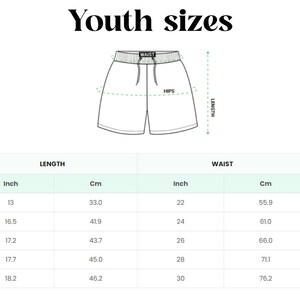 May include: A size chart for youth clothing with measurements in inches and centimetres for waist, hips, and length. The chart includes sizes YXS, YS, YM, YL, YXL, and YXXL.