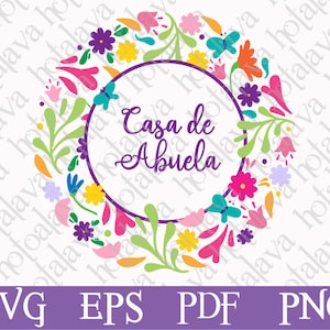 May include: A colourful floral wreath with a circle in the centre that says "Casa de Abuela".