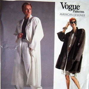 May include: Vogue Patterns American Designer sewing pattern for a long white coat and a black and white polka dot coat by Anne Klein. Pattern number 1706.