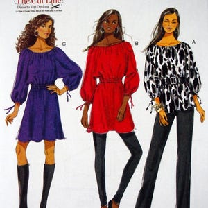 May include: Butterick B5527 sewing pattern featuring dress and top options. The pattern includes illustrations of three different styles: a purple dress, a red top, and a black and white patterned top with black pants.