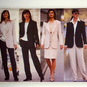 May include: A vintage Butterick sewing pattern envelope showing women's business suits. The image displays four women in blazers, trousers, and skirts in different colours. The pattern number is 5696, and the brand is Butterick.