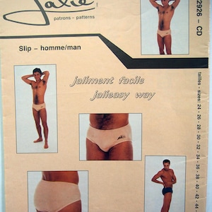 May include: A Jalie sewing pattern envelope for a pair of briefs, model 2926-CD. The beige paper packaging features the brand name, the text 'Slip - homme/man', 'jaliment facile', 'jalieasy way', and 'seam allowances included' with 15 sizes listed.