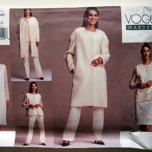 May include: Vogue Wardrobe sewing pattern featuring a cream-colored coat, pants, and skirt ensemble. The pattern includes multiple views of the outfits, with the size range 14, 16, and 18. The pattern is labeled with the number 2612.