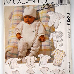 May include: McCall's sewing pattern for baby clothing. The pattern includes illustrations of a baby wearing a white outfit and several other clothing options. The pattern envelope features the McCall's logo and the number 7367.