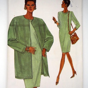 May include: A Very Easy Very Vogue sewing pattern envelope 8422 for sizes 8-10-12. The illustration shows a light green knee-length dress and a matching long-sleeved jacket with horizontal stitched detailing on the chest and cuffs.