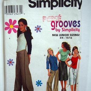 May include: Simplicity pattern 8919 for girls' clothing, featuring a variety of styles including pants, shorts, and a top. The pattern includes instructions for sizes 11/12 to 15/16.