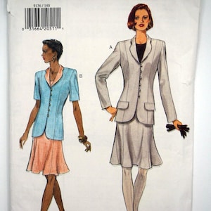 May include: A vintage Very Easy Very Vogue sewing pattern. The pattern shows illustrations of two women's suits. One is a light grey skirt suit, the other a blue jacket with a pink skirt. The pattern size is 14-16-18.