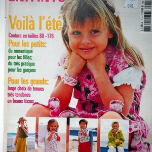 May include: A magazine cover titled "ELENA ENFANTS" features a smiling young girl with blonde hair, wearing a pink floral dress. The cover text reads "Voilà l'été" and includes information about children's clothing patterns. Below are images of children in various outfits.