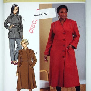 May include: Butterick sewing pattern B6918 for sizes W3 (30W-38W). The envelope features illustrations of three coat styles: a grey pinstriped jacket with trousers, a brown knee-length coat, and a long red button-front coat with pockets.