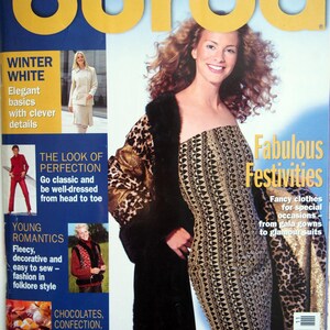 May include: A magazine cover featuring a woman in a patterned dress and a leopard-print coat. The magazine title "burda" is in large yellow letters. Text includes "Fabulous Festivities" and "World of Fashion."