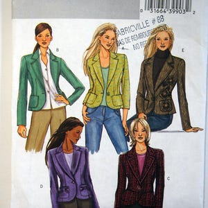 May include: A Butterick sewing pattern, B4610, showing illustrations of five blazer designs. The blazers are in various colours and styles, including green, purple, and red, with different collar and pocket designs. The pattern includes size information.