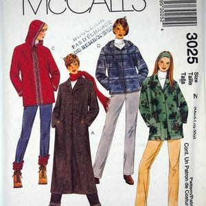 May include: A McCall's 3025 sewing pattern envelope featuring illustrations of four different jacket styles. The designs include a red hooded jacket, a long dark brown coat, a blue patterned hooded jacket, and a green jacket with a pine cone print.