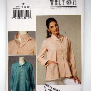 May include: A Vogue Patterns sewing pattern envelope for Marci Tilton design V8709, size FF (16-18-20-22). The package displays two jacket variations: a peach-colored striped jacket and a teal jacket, both featuring a high collar, buttons, and pockets.