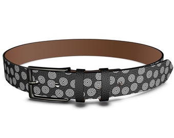 May include: A black leather belt with a white circle pattern. The belt has a silver buckle.