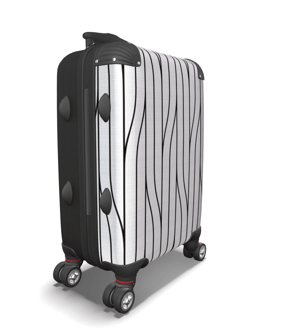 white luggage with brown trim