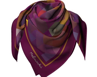 May include: A burgundy silk scarf with a geometric pattern in shades of red, orange, yellow, and purple. The scarf has a gold border and the word "Melinka" is printed in white on the bottom corner.