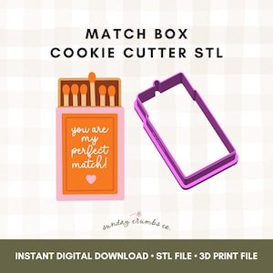 May include: A pink and orange matchbox design with the text "you are my perfect match!" and a purple rectangular cookie cutter. The image also includes the text "MATCH BOX COOKIE CUTTER STL".