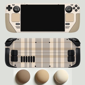 Puede incluir: Una piel de juego portátil a cuadros beige y marrón. La piel tiene un patrón a cuadros y está diseñada para adaptarse a los contornos del dispositivo. La piel se muestra sobre un fondo blanco.