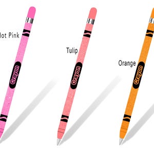 May include: Three Apple Pencil skins with Crayola crayon designs. The skins are in hot pink, tulip, and orange. Each skin has the word "Crayon" printed on it.