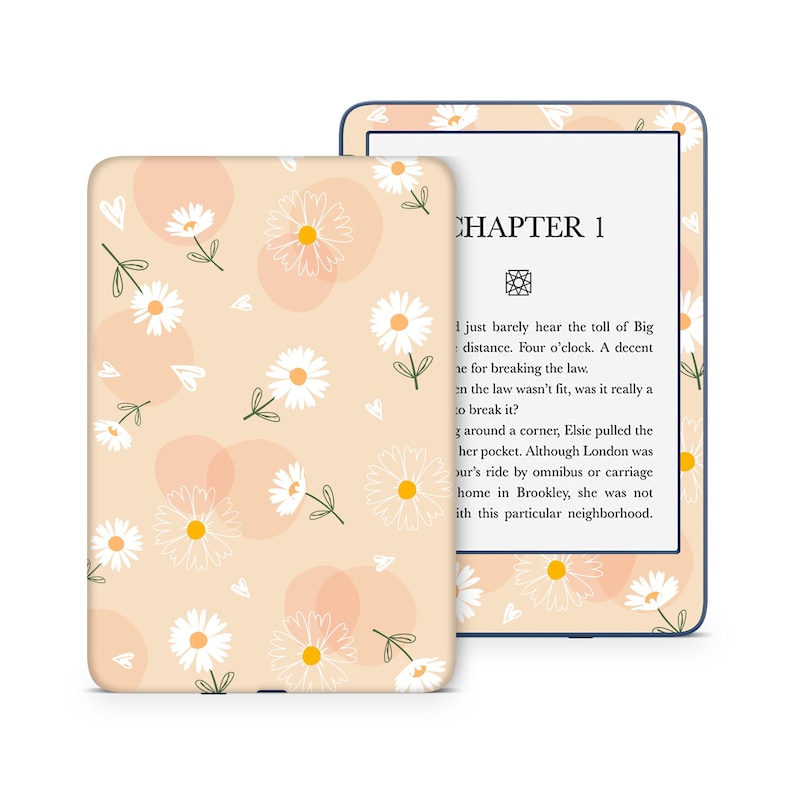 May include: A Kindle e-reader with a peach-colored case featuring a white daisy pattern. The screen displays the text "CHAPTER 1" and a short excerpt from a book.