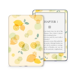 May include: A Kindle e-reader with a lemon and lime pattern on the cover. The screen displays the text "CHAPTER 1" and the beginning of a story about a woman named Elsie.