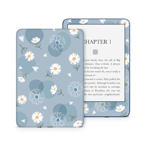May include: A blue and white floral patterned Kindle Paperwhite e-reader case with the text "CHAPTER 1" on the screen.
